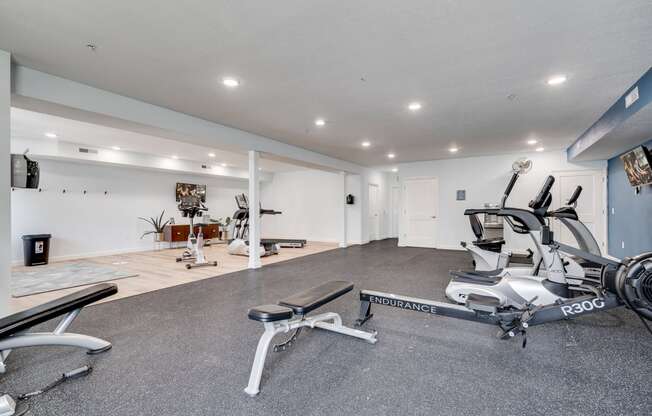 Rowing Machine & Bench At The Fitness Center