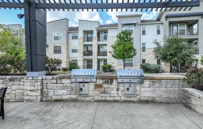 outdoor grilling area at The Allure apartments