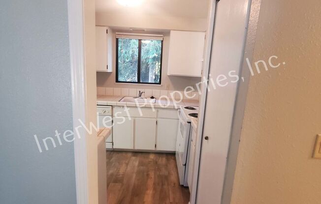 Beautiful Ranch Style Home on Very Large Corner Lot With W/D Hookups, Fireplace, 2 Car Garage & A/C Unit!