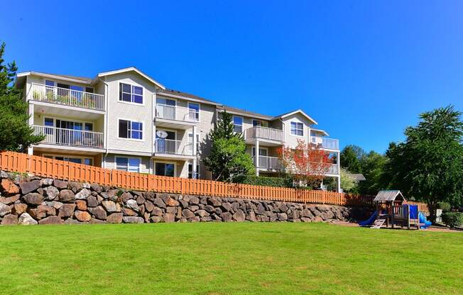 One-Bedroom Apartments in Issaquah, WA - Private Park with a Small Play Area and Manicured Lawn