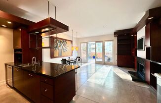 LUXURY TOP-FLOOR 2BR/2.5BA PENTHOUSE LOFT W/ PRIVATE DECK, IN-UNIT LAUNDRY & PARKING INCLUDED