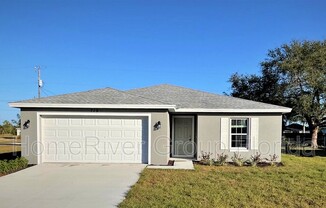 719 SW 13 TER