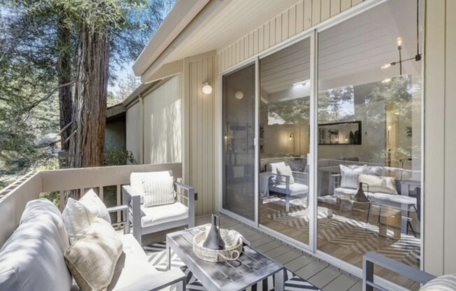 Tranquil Top-Floor End Unit with Stream Views & Resort Amenities — Blocks to Downtown