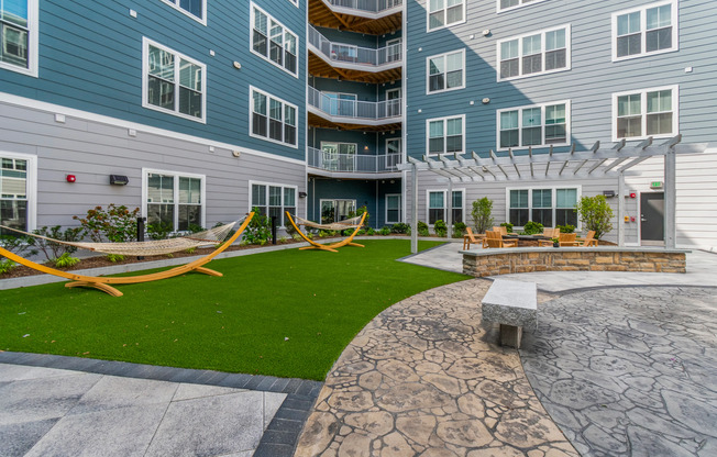 Courtyard hammock seating | The Q | Quincy, Massachusetts Apartments