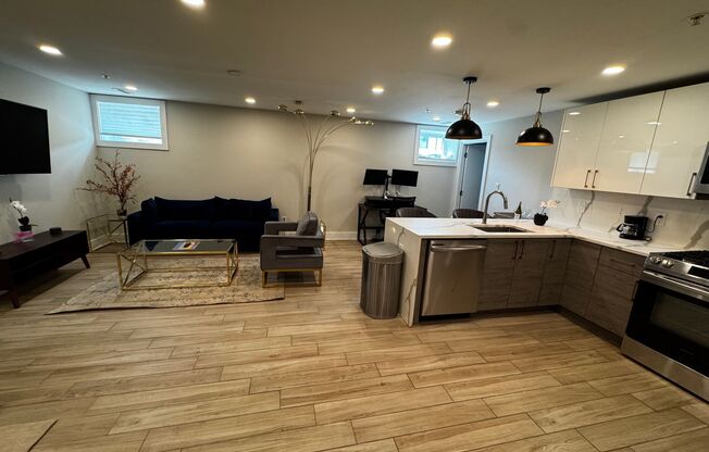 Discover this beautifully renovated 2BD/2BA FULLY FURNISHED condo in the vibrant Carver/Langston neighborhood