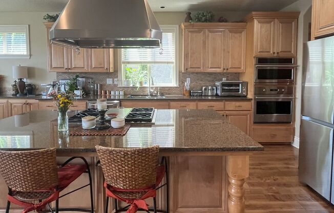 Stunning 4,593 SqFt Retreat with Dual Fireplaces & Entertainment Spaces