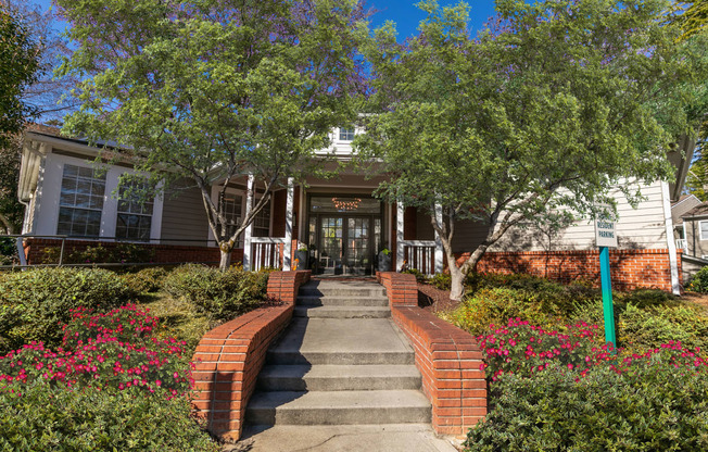 the front of a house with stairs and a sidewalk at Briarcliff Apartments, Atlanta, 30329