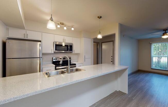 a kitchen with a large mirror