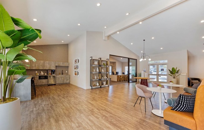 a living room and dining room with a table and chairs at Paisley and Pointe Apartments, Nevada, 89130