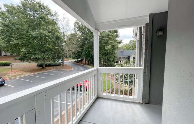 Drayton cement balcony with white railings located in Duluth,GA