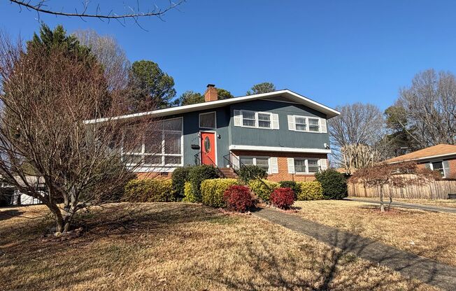 Freshly Painted Split-Level Home with Large Deck & Lawn Care Included