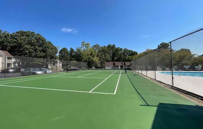 Lakes-Edge-Greensboro-NC-tennis-court  at Lakes Edge Apartments, Greensboro, NC