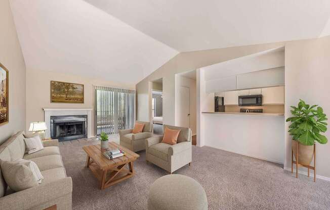 Living room with a fireplace and couches at Great Hills, Austin, TX