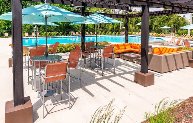 Swimming Pool with Lounge and Bistro Seating at Padonia Village Apartments, Timonium
