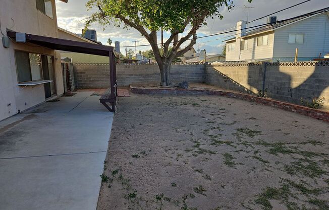 Spacious 4-Bedroom Home with Large Backyard & Covered Patio!