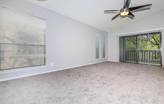 a living room next to a window