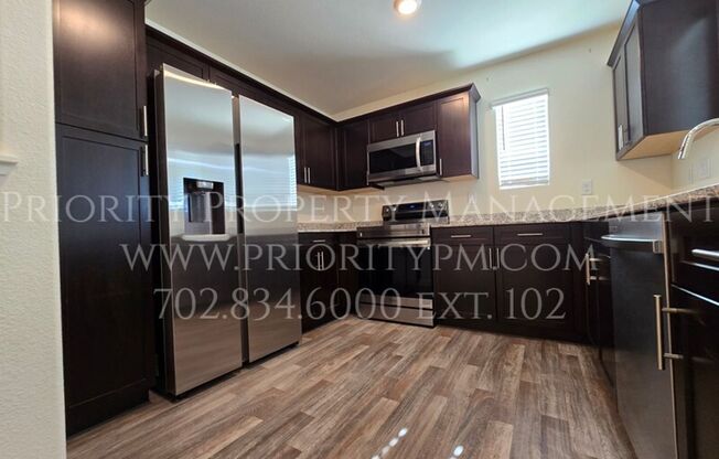 Gated~ 3 Bedroom ~ 2 Bath Townhome w/2 Car Garage~MUST SEE!