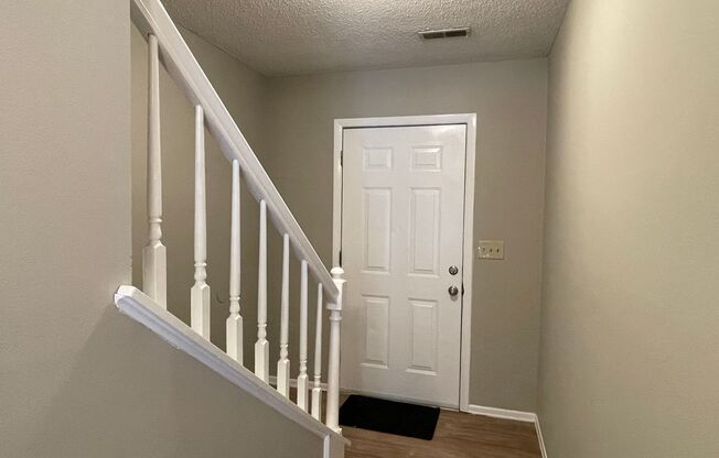 SW - Updated Townhome.  New Flooring, Just Painted, FP, Fenced Patio!