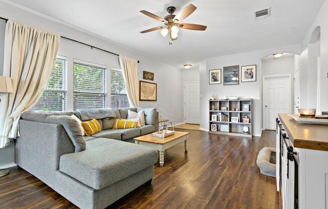 Open Floorpan is Move in Ready just for you! Wood look laminate and Tile run throughout the home with carpet only in the bedrooms.