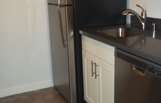 Ground Floor unit with a nice upgrade and small fenced Patio