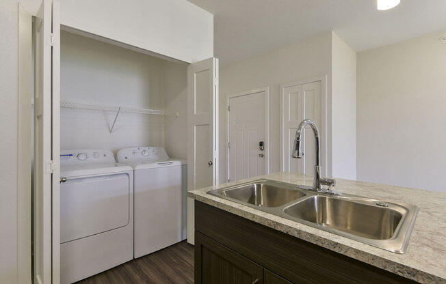 Washer And Dryer In Unit at Dodson Pointe Apartment Homes, Rogers, Arkansas