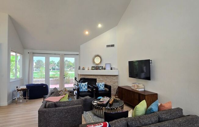 STUNNING GOLF COURSE AND WATER VIEWS IN GUARD-GATED SPANISH TRAIL!