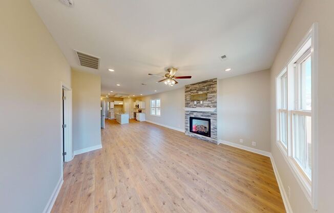 Stylish Home with Feature Stone Front Fireplace, Open Layout and Premium Upgrades