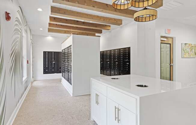 a wine room with white cabinets and white walls