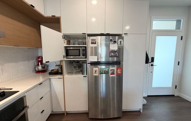 Top‑Floor Corner Condo with Downtown Views — Stylish, Pristine, and Steps From Everything