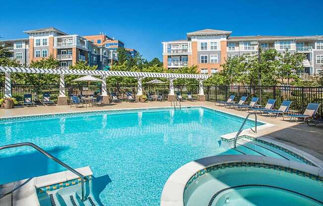 the swimming pool at the preserve at polo towers apartments tx