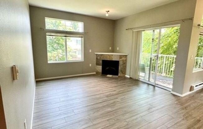 Charming corner 2 bedroom 2 bath with attached Garage!