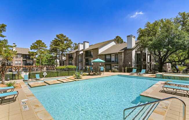 Sparkling pool at Camino del Sol apartments in Denton, TX