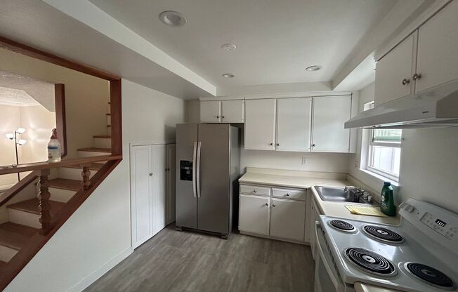 Two story Cypress townhouse, garage, patio, laundry and pool access