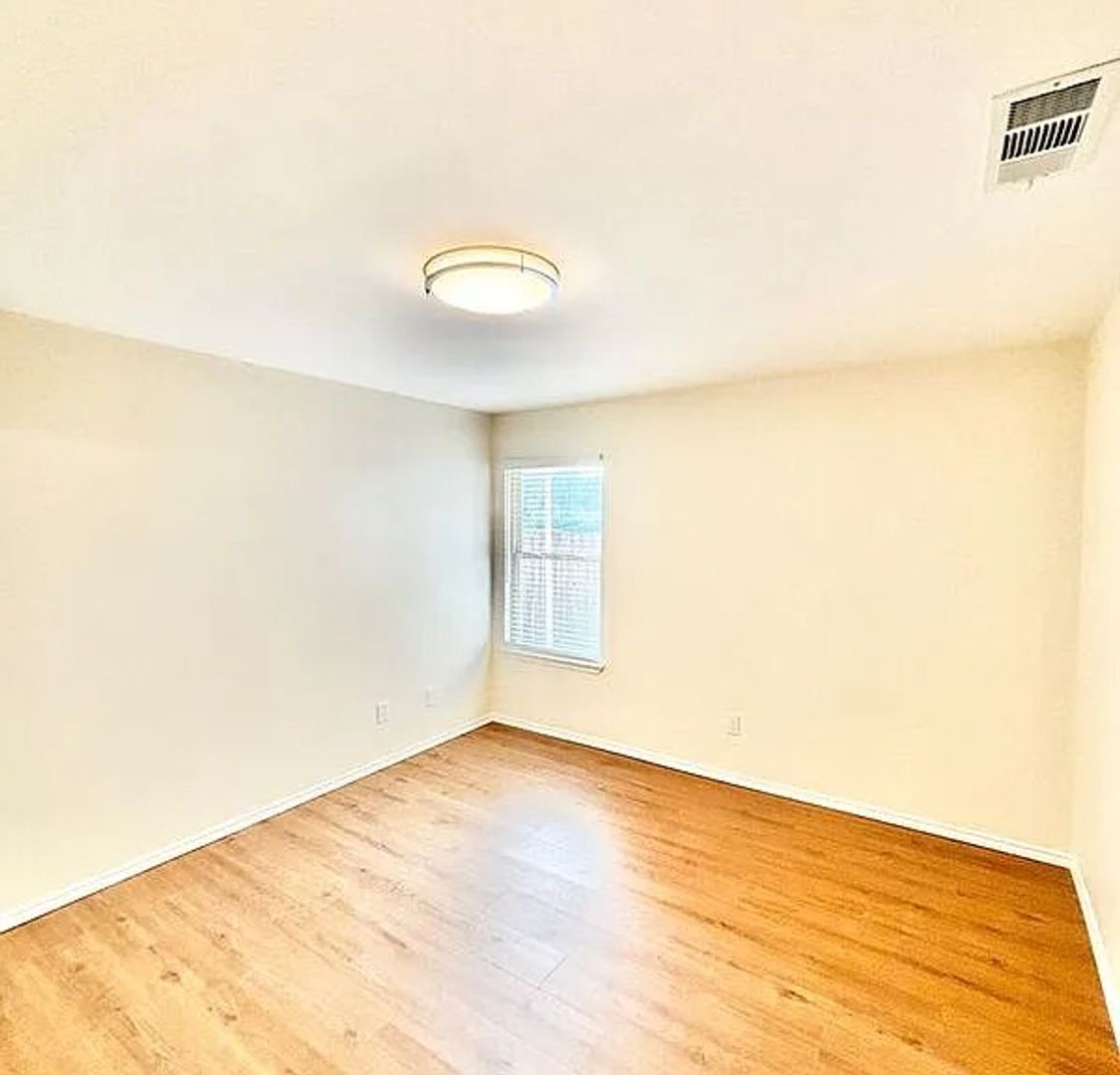 The bright and open living room creates a welcoming