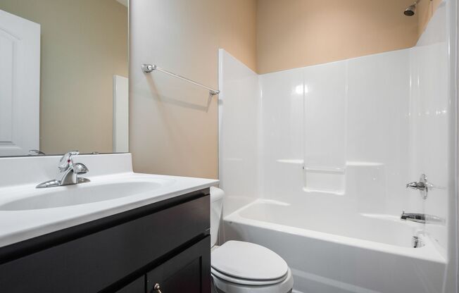 Beautiful 4BR, 2.5BA End Unit Townhome in East Raleigh - Available Now!