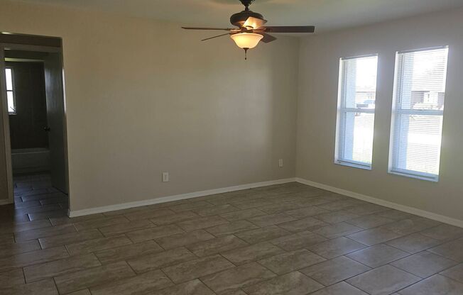 3/2/2 Single Family Home with Fenced in Yard!