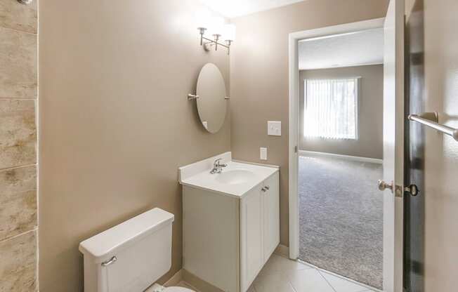 This is a photo of the primary bathroom of an upgraded 950 square foot, 2 bedroom apartment at Deer Hill Apartments in Cincinnati, OH.