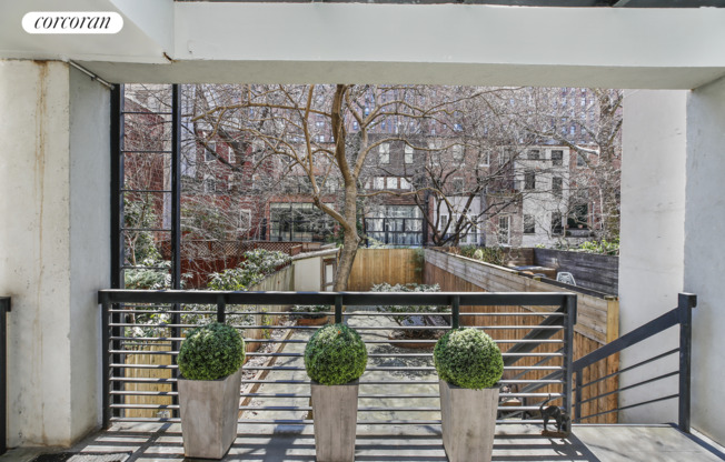 448 W 25 ST