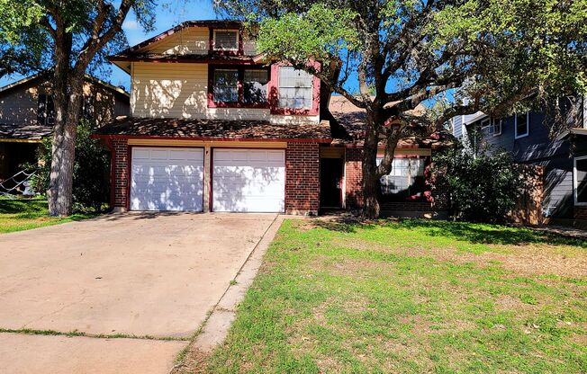 Warm & Inviting 4BR / 2.5BA Home with Covered Deck and 2-Car Garage