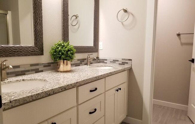 Fantastic Updated Corner Two-Level Unit in a Convenient Location!