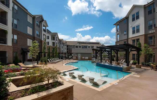 Outdoor Courtyard with Beautiful Landscaping and Swimming Pool