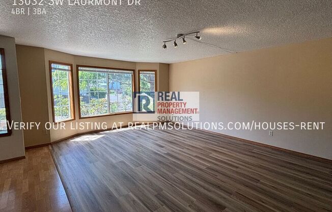 13032 SW LAURMONT DR