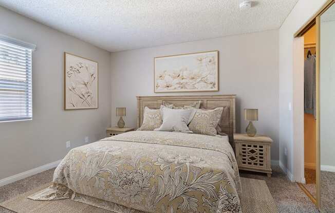 1-Bedroom Apartments in Murrieta, CA - Waterstone at Murrieta - Spacious Bedroom With Plush Carpeting, Closet With Sliding Mirror, And A Window