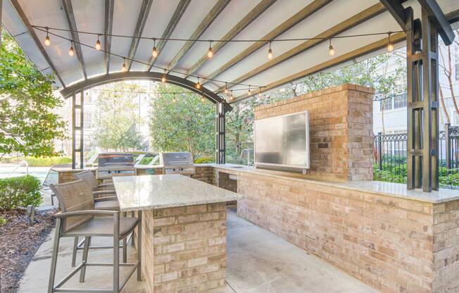 Outdoor grill area at luxury apartments for rent in Atlanta, GA.