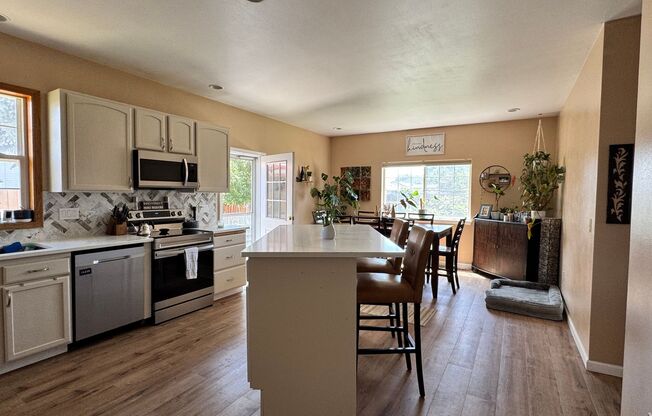 Occupied, do not disturb tenants. West Valley 3 br 2ba Dbl garage, LVP flooring and more!