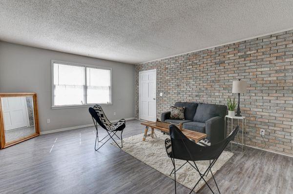 Renovated living space with accent wall at The Retreat at St Andrews, Columbia, 29210