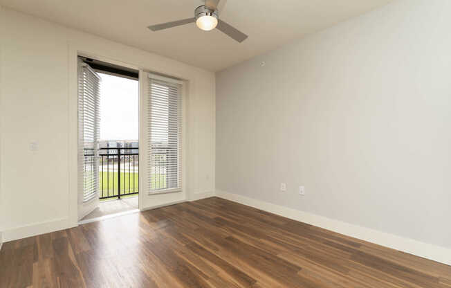 Living Room with Balcony and Hard Surface Flooring