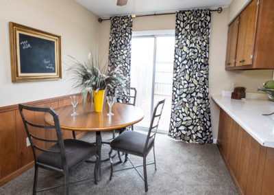 Model unit kitchen with stove and microwave.