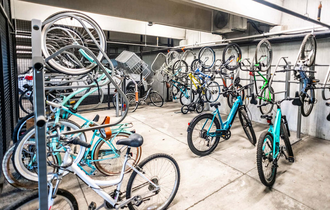 a lot of bikes parked in a parking garage
