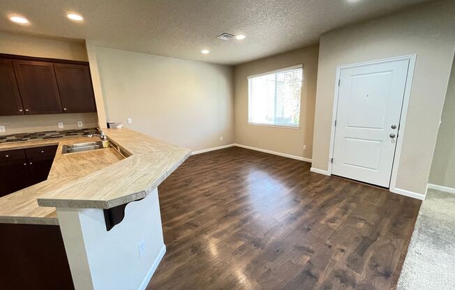 Spacious 4-Bedroom Home with Inviting Curb Appeal, Modern Kitchen, and Backyard Retreat